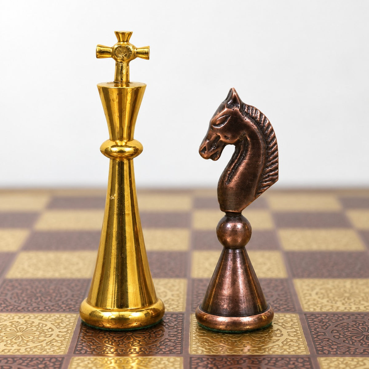 14-Inch Modern Luxury Brass Chess Set with Antique Copper & Gold Metal Pieces and Board - king and knight close-up