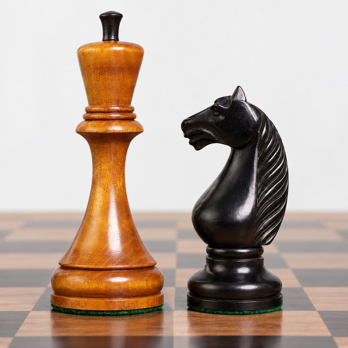 1935 Botvinnik-Flohr II Soviet Chess Set Combo - Antiqued & Ebonized Boxwood Pieces with Chessboard and Storage Box - king and knight close-up