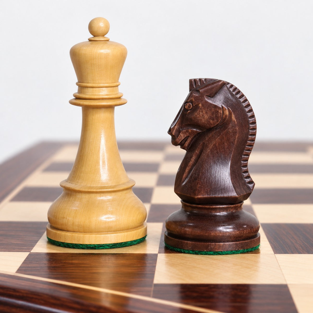 1950s Fischer Dubrovnik Chess Set Combo with Mahogany-Stained & Boxwood Pieces, 21" Chessboard, and Leatherette Storage Coffer - king and knight close-up