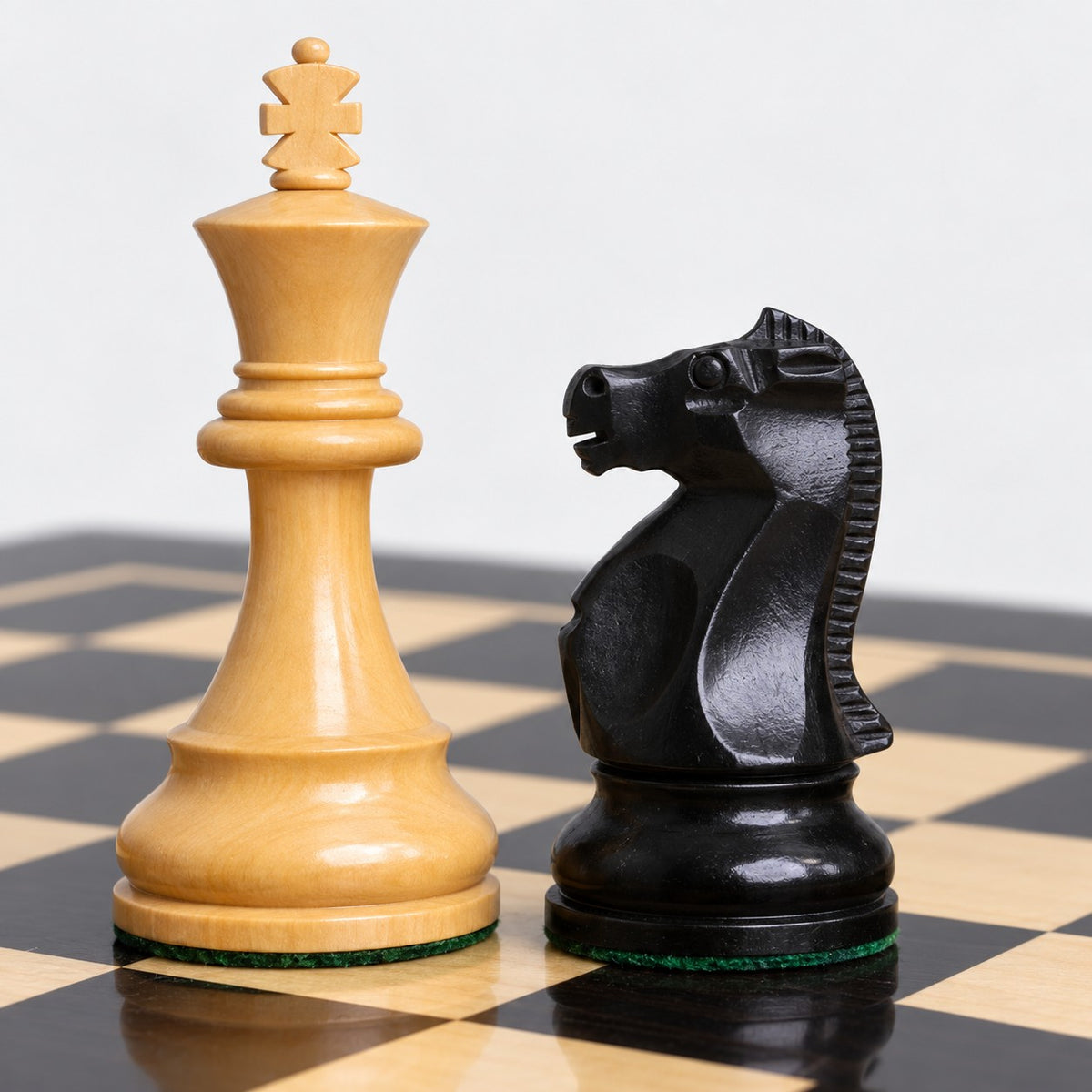 1972 Fischer-Spassky Championship Chess Set Combo with Ebonized Boxwood Pieces, Ebony Chessboard & Storage Box - king and knight close-up