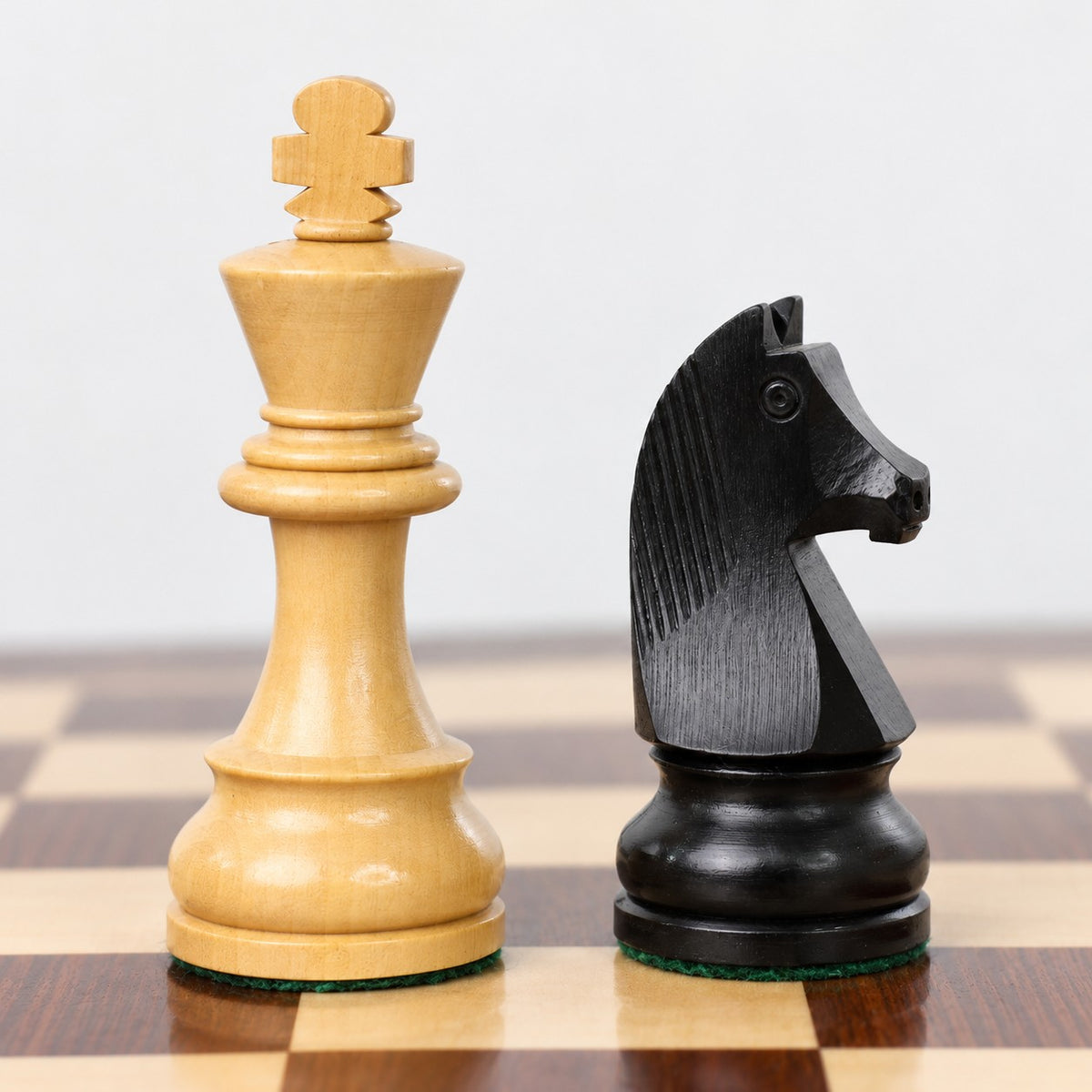 3.8-Inch Championship Chess Set - Ebonized Boxwood Pieces with Folding Board & Storage Box - king and knight close-up