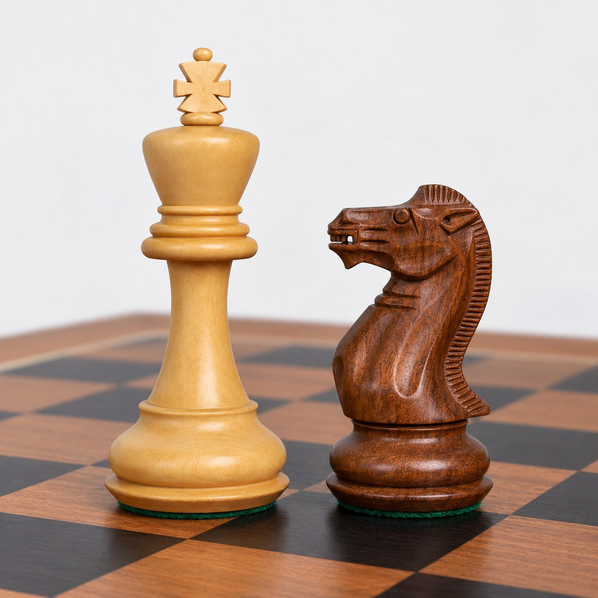 4.1" Pro Staunton Weighted Golden Rosewood Chess Set with 22.5" Ebony & Acacia Chessboard and Storage Box Combo - king and knight close-up