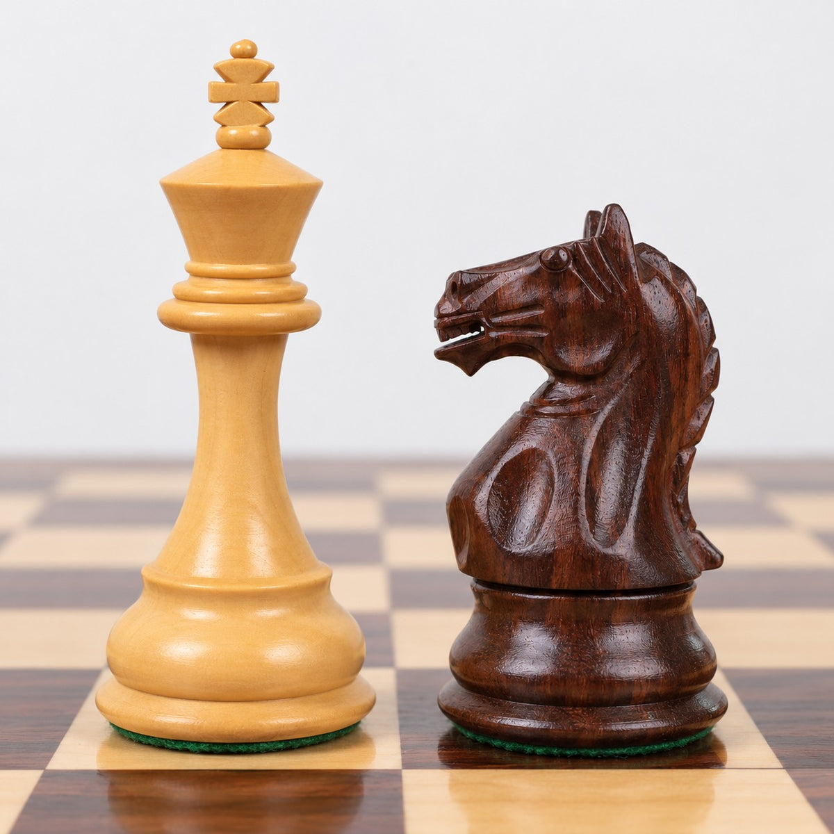 Fierce Knight 4-Inch Staunton Chess Set with Rosewood Pieces, Chessboard and Storage Box - king and knight close-up
