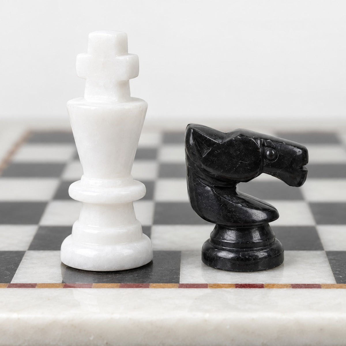 Handcrafted Black & White Marble Chess Set - 12" Board with Hand-Carved Pieces, Elegant Gift for Chess Lovers - king and knight close-up