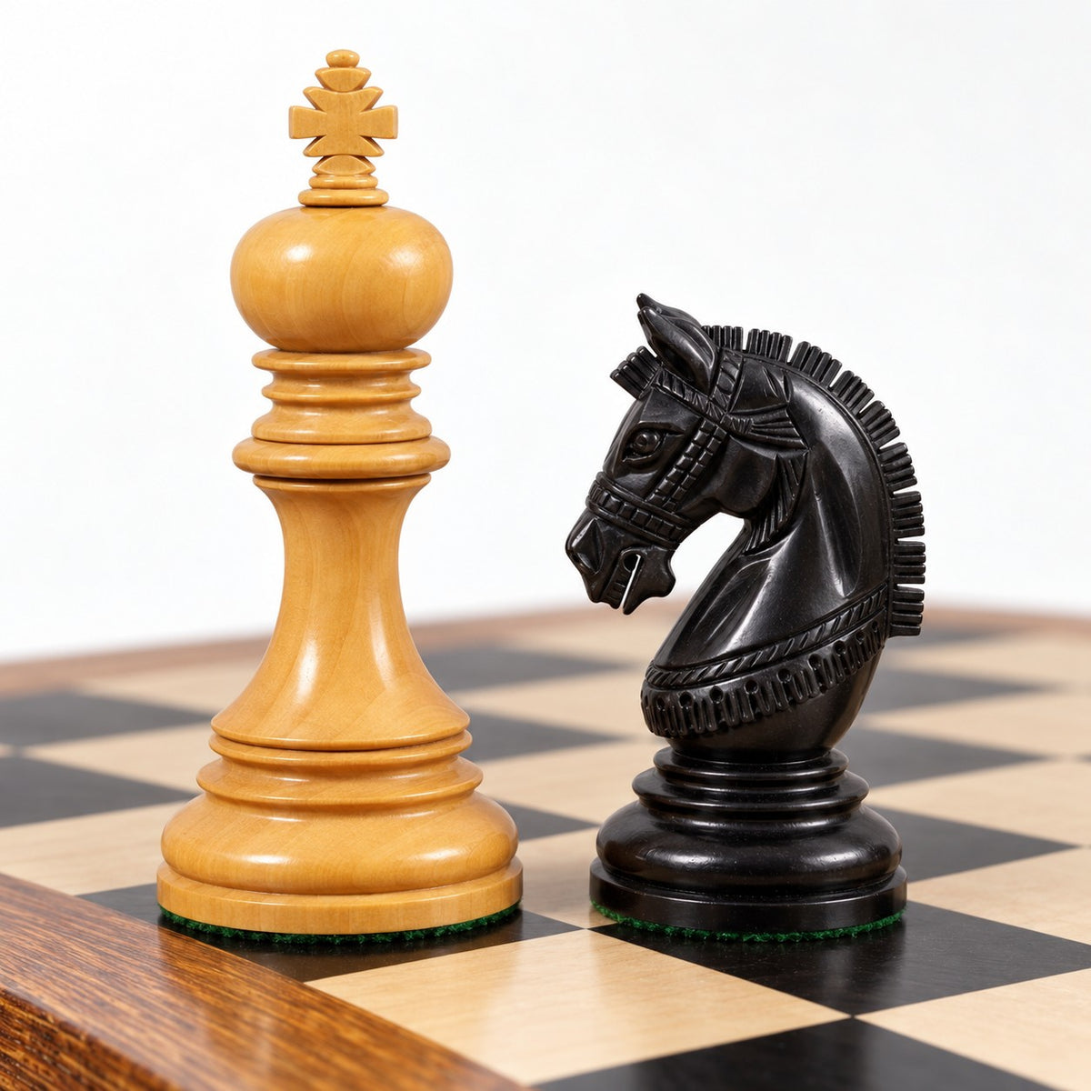 Luxury 4.1-Inch Stallion Staunton Ebony Wood Chess Set with 23-Inch Ebony & Maple Board and Storage Box - king and knight close-up