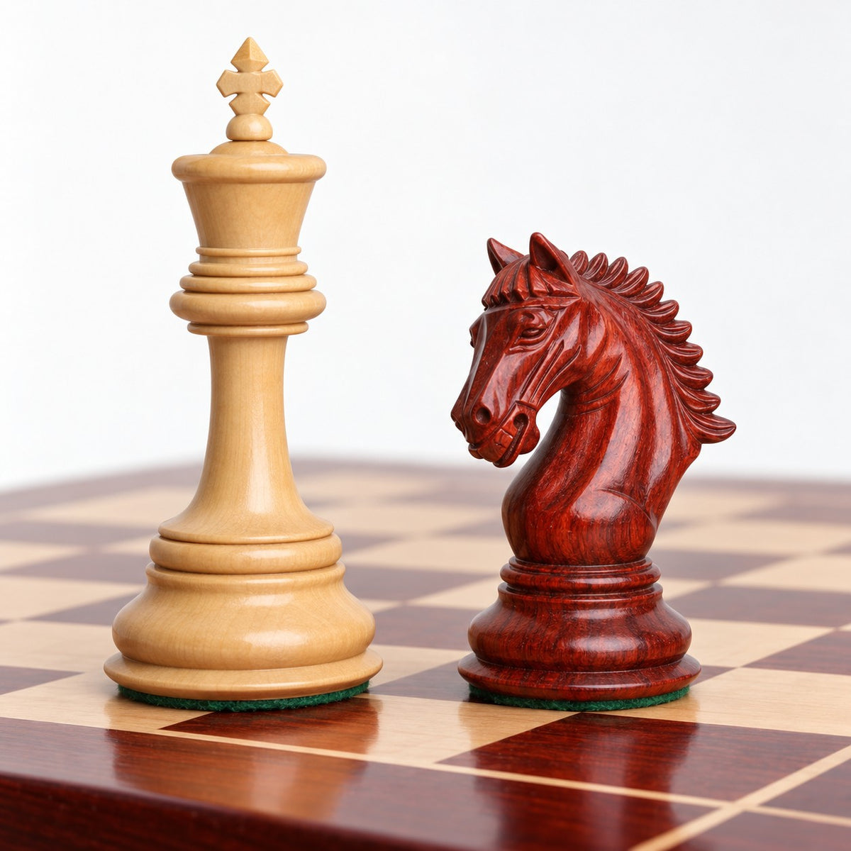 Luxury 4.3" Tilted Knight Staunton Chess Set - Bud Rosewood & Boxwood Pieces with 23" Bud Rosewood & Maple Chessboard and Storage Box - king and knight close-up