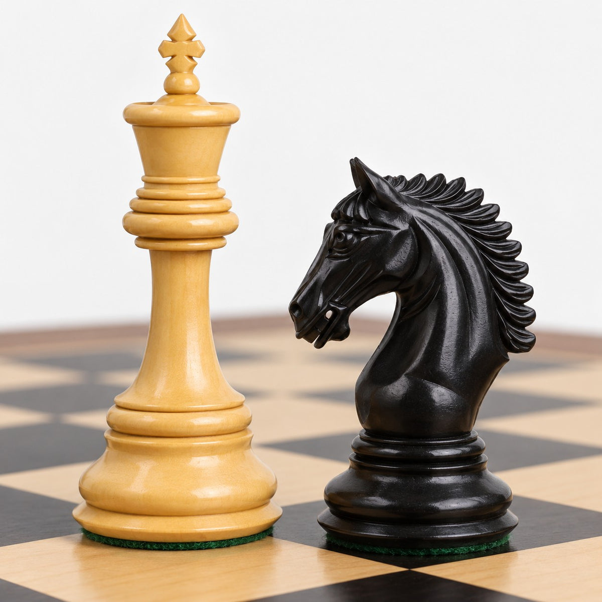 Luxury 4.3" Tilted Knight Staunton Chess Set Combo - Ebony & Boxwood Pieces with 23" Ebony and Maple Wood Chessboard and Storage Box - king and knight close-up